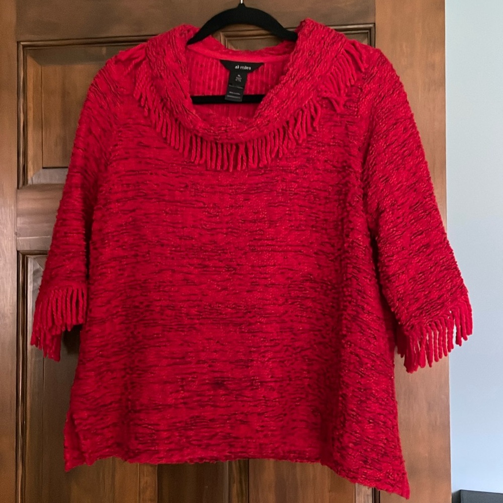 Ali Miles  fun red casual sweater top with fringed sleeves and neckline.